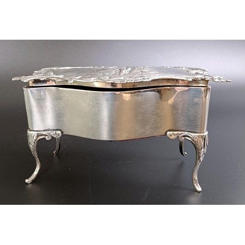 286 - An Edward VII silver jewellery box, with chased decoration, London 1905, 14.5 cm wide