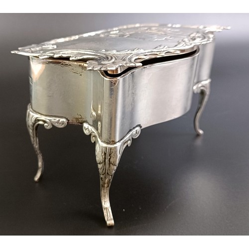 286 - An Edward VII silver jewellery box, with chased decoration, London 1905, 14.5 cm wide