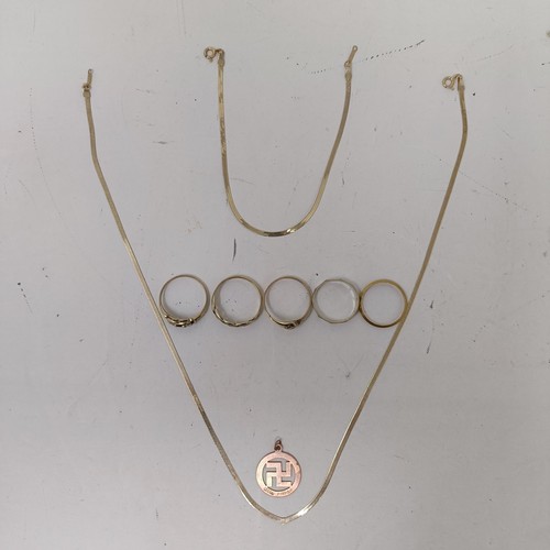 810 - A 9ct gold necklace, a matching bracelet, four 9ct gold gem set rings, and a 9ct gold pendant, 11.6 ... 