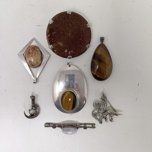 636 - A silver and tiger's eye pendant, and assorted other silver coloured metal jewellery