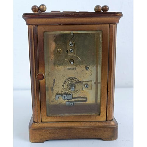 1021 - A carriage clock, a Staffordshire figure and assorted other items (4 boxes)