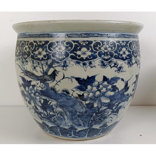 1026 - A Chinese reticulated vase, converted to a lamp, a blue and white vase, a blue and white bowl, a jar... 