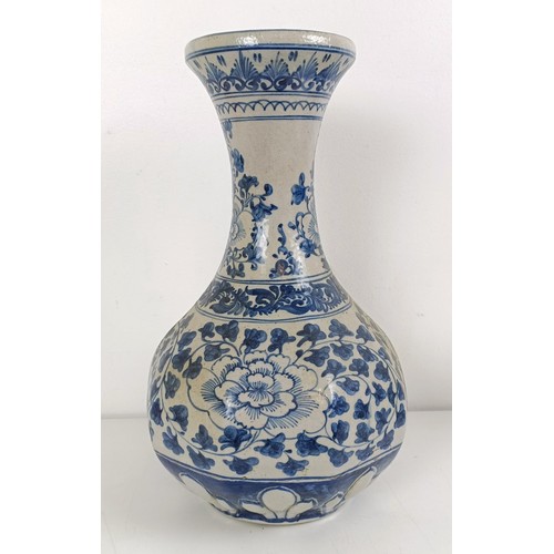 1026 - A Chinese reticulated vase, converted to a lamp, a blue and white vase, a blue and white bowl, a jar... 