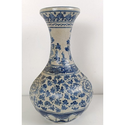 1026 - A Chinese reticulated vase, converted to a lamp, a blue and white vase, a blue and white bowl, a jar... 