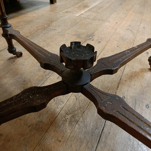 1226 - A 19th century walnut folding card table, on turned tapering legs, joined by an X stretcher, 93 cm w... 