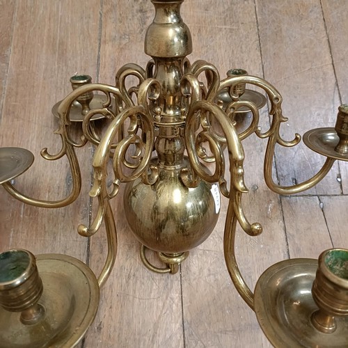 1230 - A Dutch style brass chandelier, 50 cm diameter