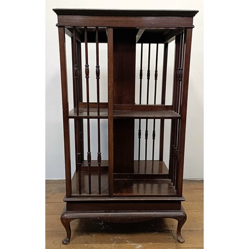 1234 - A mahogany revolving bookcase, 50 cm wide