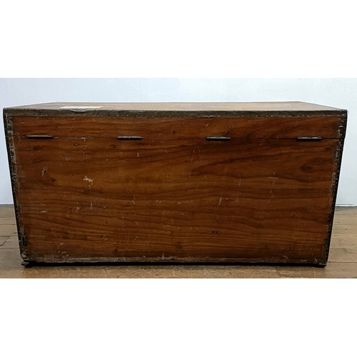 1241 - A 19th century camphorwood and brass bound trunk, 100 cm wide