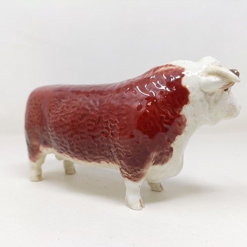 1003 - A Beswick Hereford Bull, 1363A, a Hereford Cow, 1360, and a Hereford Calf, 1827C, all gloss (3)...