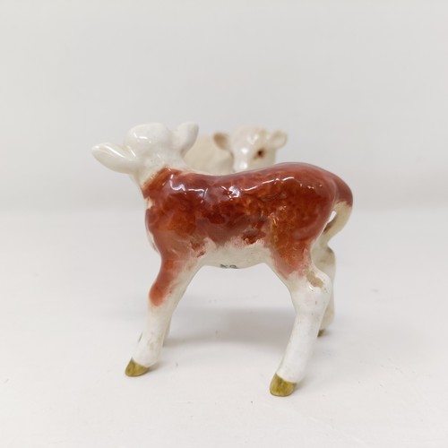 1005 - A Beswick Hereford Calf, 1406B, a Charolais Calf, 1827B, and a Highland Calf, 1827D, all gloss (3)