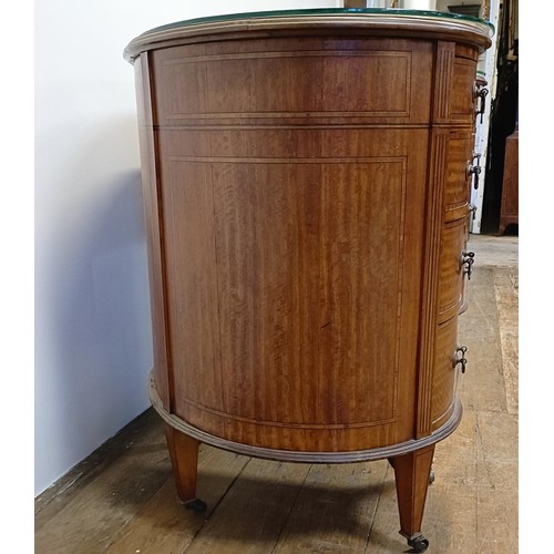 1245 - A late 19th/early 20th century inlaid satinwood kidney shaped desk, having a nine drawer configurati... 