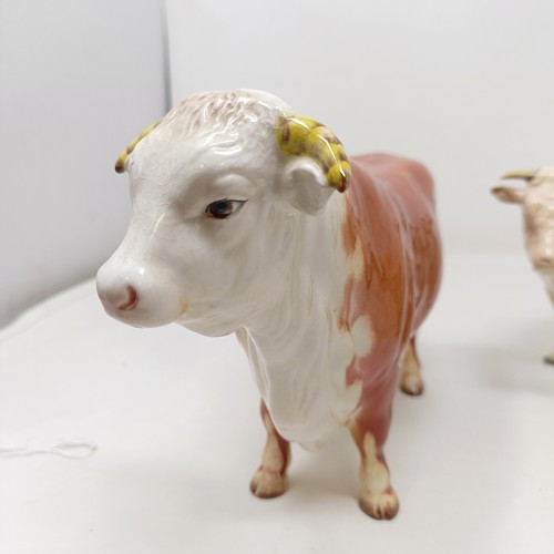 1011 - A Beswick Hereford Bull, 949, a Highland Bull, 2008, and a Charolais Bull, 2463A, all gloss (3)