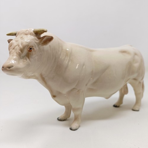 1011 - A Beswick Hereford Bull, 949, a Highland Bull, 2008, and a Charolais Bull, 2463A, all gloss (3)