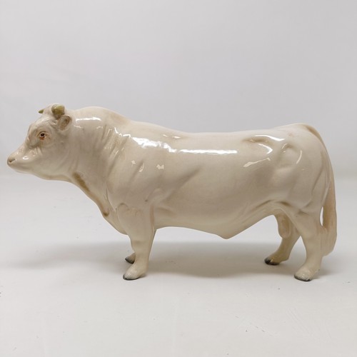 1011 - A Beswick Hereford Bull, 949, a Highland Bull, 2008, and a Charolais Bull, 2463A, all gloss (3)