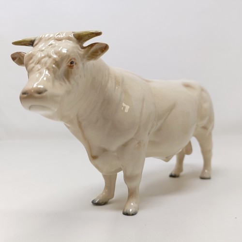 1011 - A Beswick Hereford Bull, 949, a Highland Bull, 2008, and a Charolais Bull, 2463A, all gloss (3)