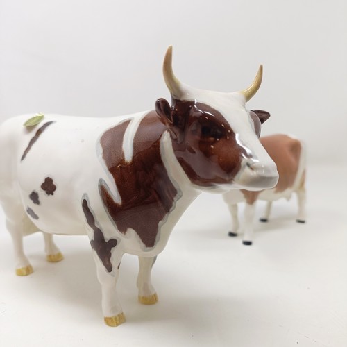 1012 - A Beswick Ayrshire Bull, 1454B, and an Ayrshire Cow, 1350, both gloss (2)