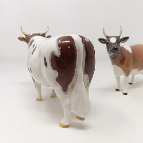 1012 - A Beswick Ayrshire Bull, 1454B, and an Ayrshire Cow, 1350, both gloss (2)