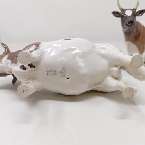 1012 - A Beswick Ayrshire Bull, 1454B, and an Ayrshire Cow, 1350, both gloss (2)