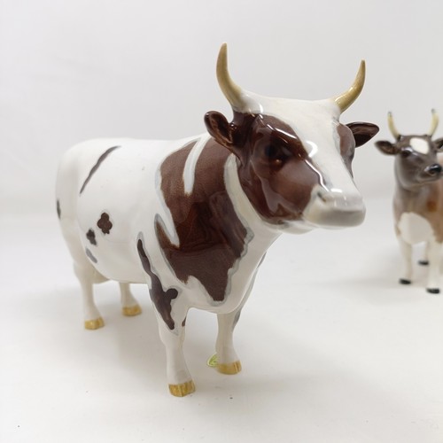 1012 - A Beswick Ayrshire Bull, 1454B, and an Ayrshire Cow, 1350, both gloss (2)