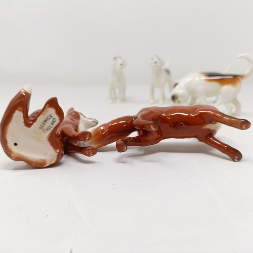 1014 - Four Beswick Foxhounds, 942 x 2, 943 and 2265, and two foxes, 1440 and 1748, all gloss (6)...