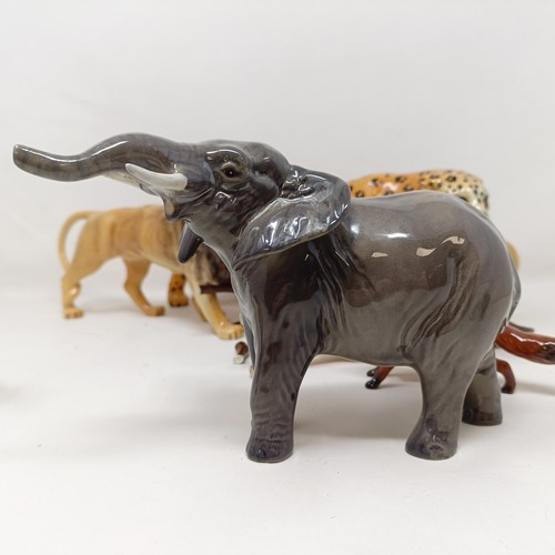 1015 - A Beswick Leopard, 1082, a Lion, 1506, a Lion Cub, 2098, an Elephant, 974, a Fox, 1440, a Stag, 981,... 