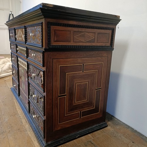 1253 - An 18th century Italian collector’s cabinet, with geometric and other inlaid decoration, the arrange... 