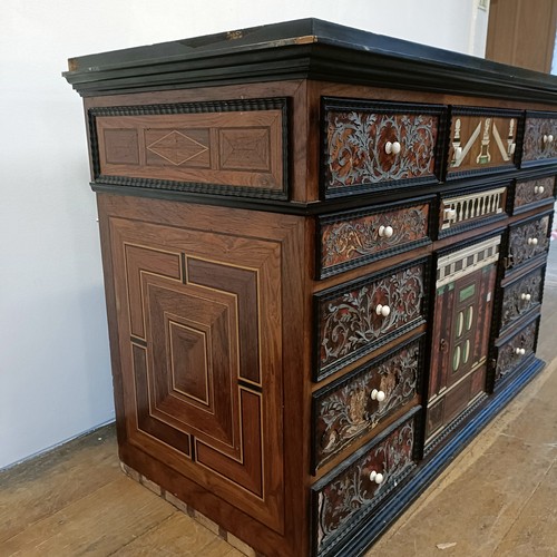 1253 - An 18th century Italian collector’s cabinet, with geometric and other inlaid decoration, the arrange... 