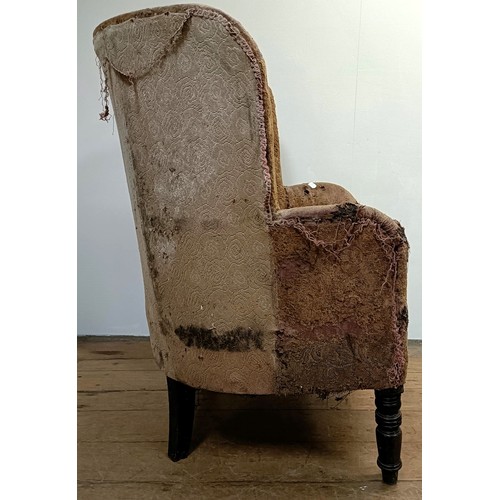 1255 - A late 19th/early 20th century tub chair, in need of extensive restoration