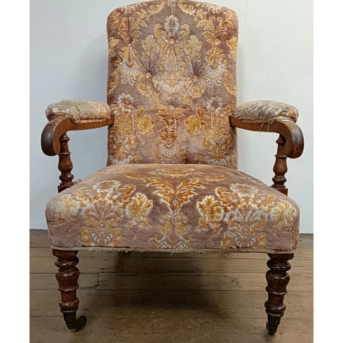 1256 - A 19th century walnut framed button back armchair