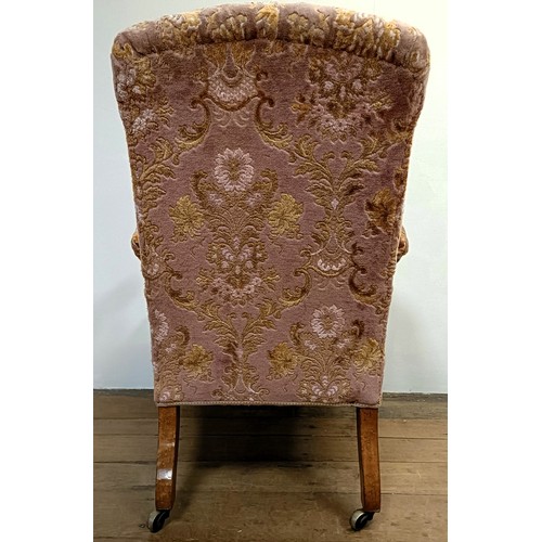 1256 - A 19th century walnut framed button back armchair