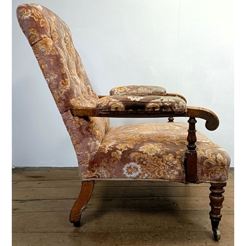 1256 - A 19th century walnut framed button back armchair