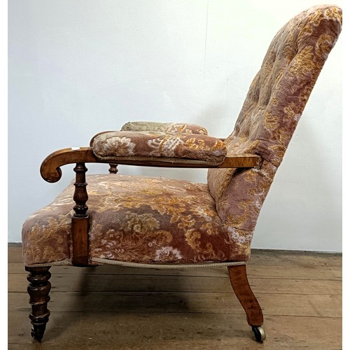 1256 - A 19th century walnut framed button back armchair