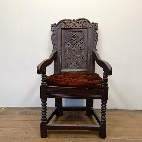 1262 - An oak Wainscot type armchair