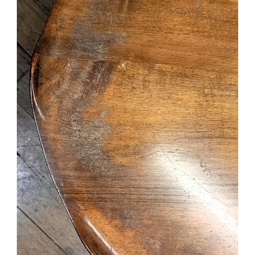 1280 - A 20th century walnut lily pad coffee table, on carved cabriole legs, 82 cm diameter