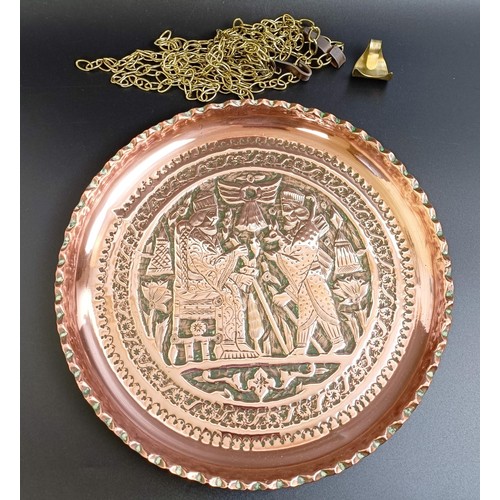 1295 - A large Benares type copper tray, decorated figures, 110 x 76 cm, a brass tray, 26 cm diameter, and ... 