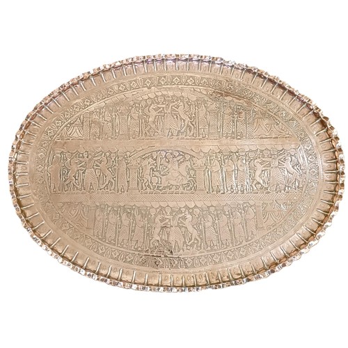 1295 - A large Benares type copper tray, decorated figures, 110 x 76 cm, a brass tray, 26 cm diameter, and ... 