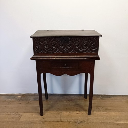 1299 - An oak bible box, 70 cm wide, on a later stand