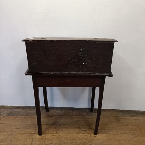 1299 - An oak bible box, 70 cm wide, on a later stand