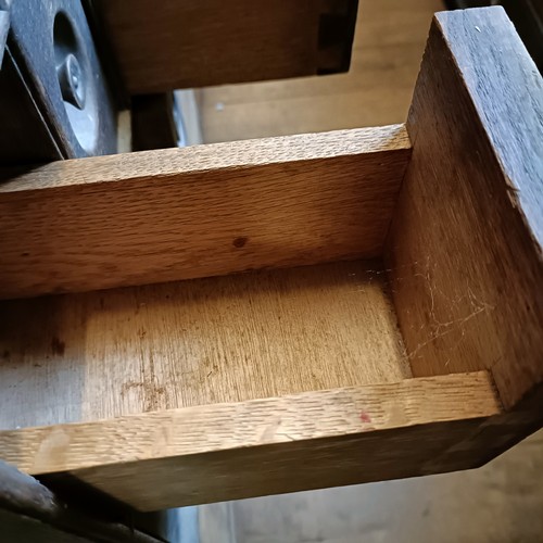 1224 - An oak chest, having nine drawers, 38 cm wide