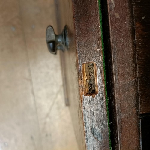 1302 - A mahogany cupboard, converted from a commode, 66 cm wide