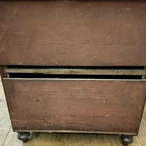 1302 - A mahogany cupboard, converted from a commode, 66 cm wide