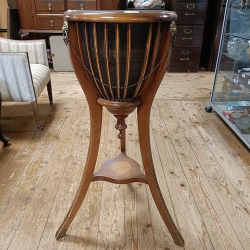 1238 - A mahogany planter, with a glass liner, 36 cm diameter