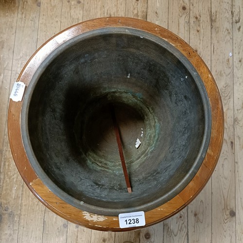 1238 - A mahogany planter, with a glass liner, 36 cm diameter