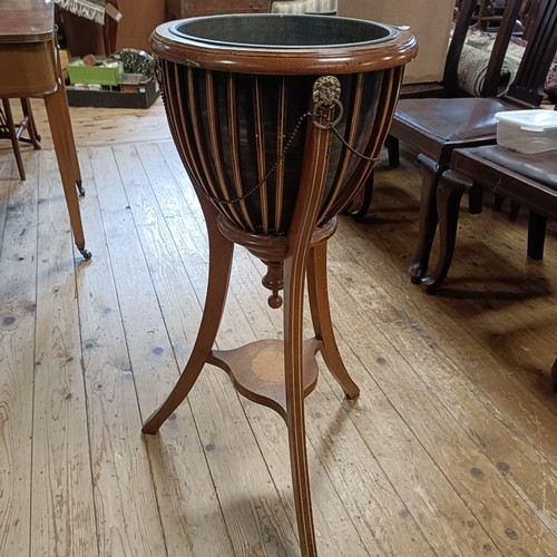 1238 - A mahogany planter, with a glass liner, 36 cm diameter