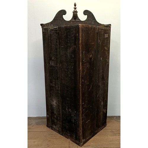 1306 - A mahogany corner cabinet, with a single glazed door, 72 cm wide