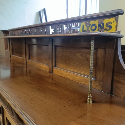 1232 - A mahogany breakfront bookcase, with five glazed doors, 206 cm wide