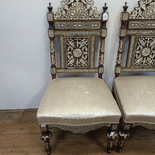 1251 - A pair of Damascene hardwood and mother of pearl inlaid hall chairs (2)