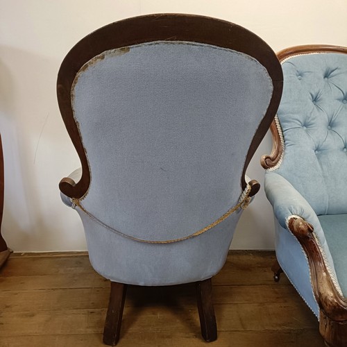 1257 - A Victorian mahogany framed button back armchair, and another similar (2)