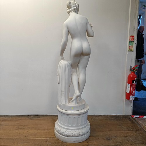 1312 - A composite marble statue, in classical form, of a nude, 55 cm high