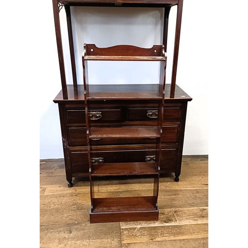 1318 - A mahogany open bookcase, 48 cm wide, a side table, 87 cm wide, and a walnut chest, having two short... 